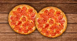 2 Pizzas de Pepperoni medianas de 6 porciones: antes $37.800 ahora $29.900. Usuarios nuevos.